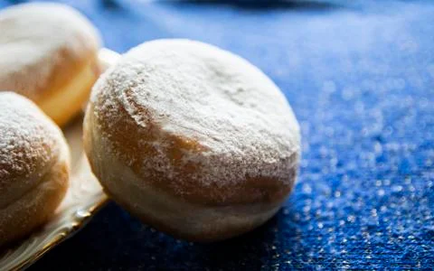 Sweet donuts blue background Stock Photos