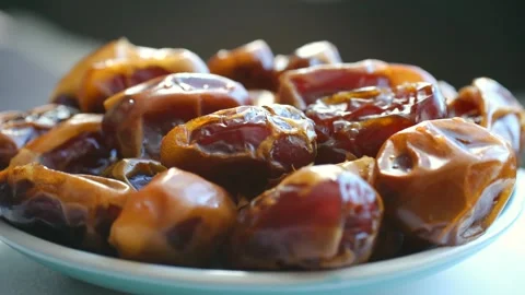 Sweet dried dates fruit in a bowl Stock Footage 337893172