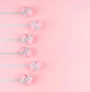 Sweet easter background - easter eggs with silver ribbon stripes as border on Stock Photos