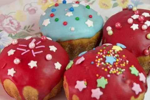 Sweet Easter bread closeup. homemade muffins, with melted sugar dark red gl.. Stock Photos