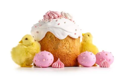 Sweet Easter cake with meringue, painted eggs and chicks on white background Stock Photos