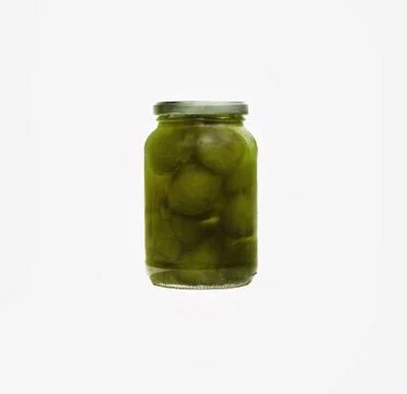 Sweet of fig conserved on a transparent jar Stock Photos