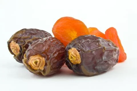 Sweet figs and dried apricots on white background Stock Photos