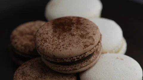 Sweet French coffee macaroons on white plate closeup Stock-Footage 114027853