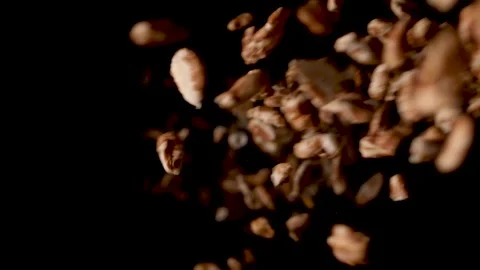 Sweet honey pops dropping down into black background in slow-motion. Stock Footage 153600080