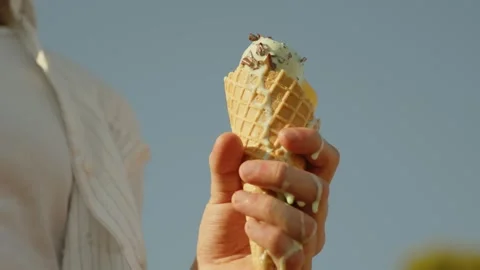 Sweet ice cream dripping from the hand in summer, Marseille, France Stock Footage 291303047