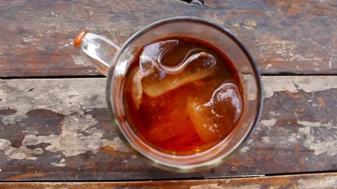Sweet Iced Tea in Glass – Refreshing Drink on Wooden Table Stock Footage 308081826