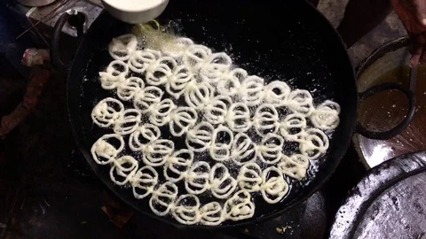 Sweet item Jilaibi is preparing Video stock 100865573