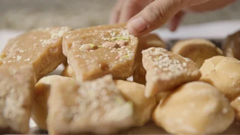 Sweet Jaggery in plate Stock Footage 224018954