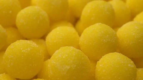Sweet lemon candy Mixed of Snack Sugar rotate background. Stock Footage 92599416