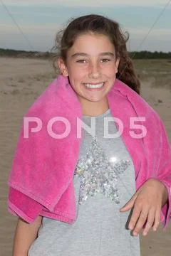 Sweet little girl outdoors with curly hair in the wind Stock Photos