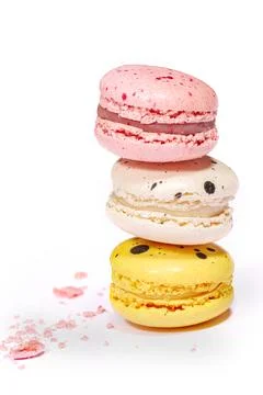 Sweet macaroons macarons stack isolated on white background. French cookies.. Stock Photos