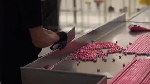 Sweet-maker cuts rock candy at high speed with robotic precision Stock Footage 272992410