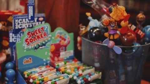 Sweet maker &amp; whirly pop in candy store. Stock Footage 106356978