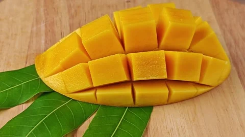 Sweet mango cubes. Zoom in, Stock Footage 307844351