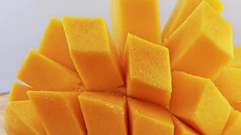 Sweet mango slice cube, rotation. Stock Footage 310550649