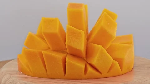 Sweet mango slice cube, rotation. Stock Footage 310550672