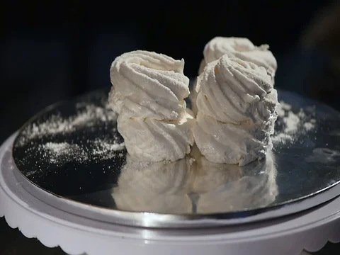 Sweet marshmallows on a plate Stock Footage 82443699