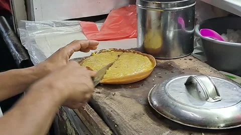 Sweet martabak cut in half Stock Footage 219171996