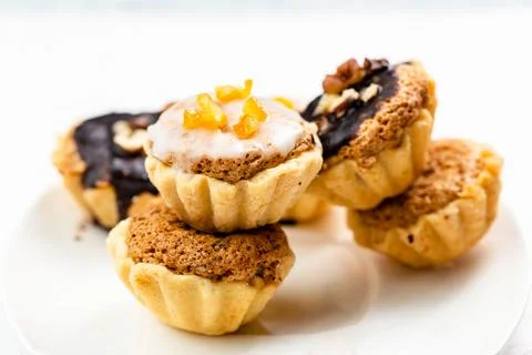 Sweet mini tart served on white plate Stock Photos