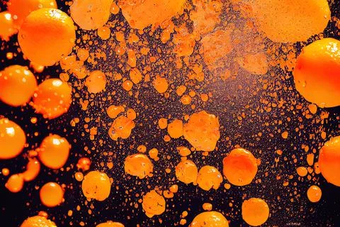 Sweet orange juice explosion, splash through flying fruits. Nectar, extract,  Stock Illustration