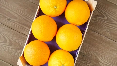 Sweet oranges in a crate. Stock Footage 245681438