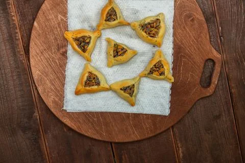 Sweet pastries triangular gomentashi ears of Haman for Purim on 写真素材
