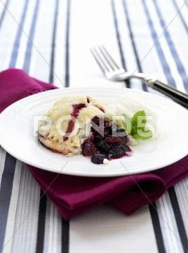Sweet pastry with berry filling Stock Photos