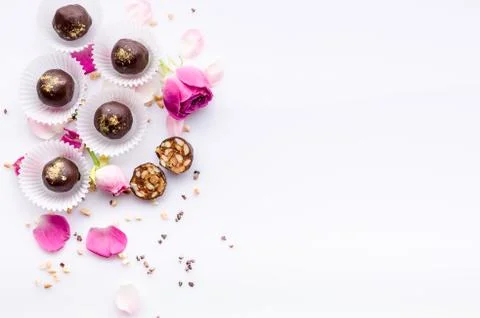 Sweet pattern. Top view handmade chocolate candies with nuts and honey. Gourm Stock Photos