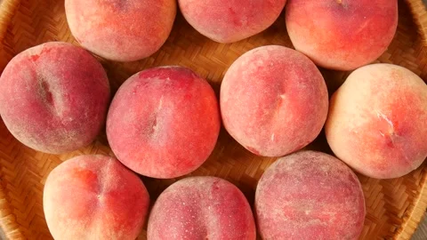 Sweet peaches in a basket. Stock Footage 296879260