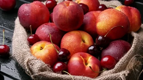 Sweet peaches on the table with burlap cloth. organic fruit Stock Footage 157684773
