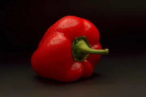 Sweet pepper on black background Stock Photos