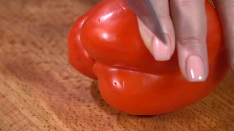 Sweet pepper cut on a cutting board. Slow motion 動画素材 101734964