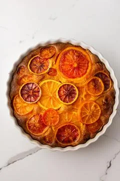 Sweet pie with caramelized citrus fruits Stock Photos