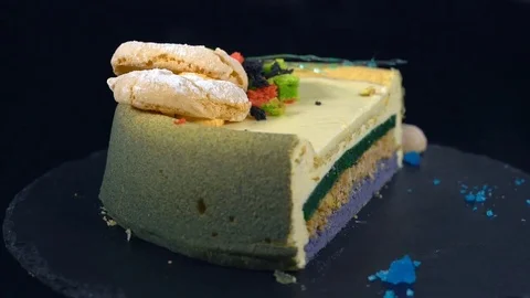 Sweet pie on a rotating table on a dark background Stock Footage 82080994