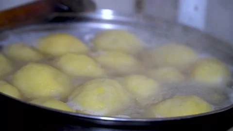 Sweet plum dumpling and a piece of yeast dough. Cooking plum dumplings, hombovci Stock Footage 212680672