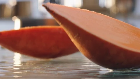 Sweet potato cut in half Stock Footage 120461691