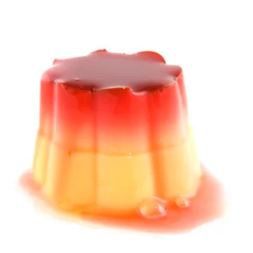 Sweet pudding with raspberry sauce Stock Photos