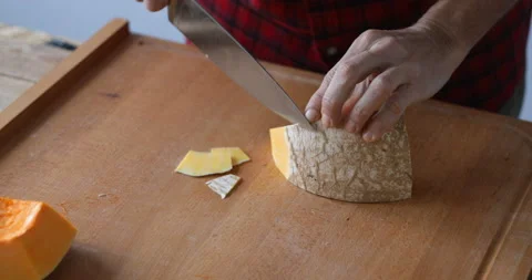 Sweet pumpkin peeling, close up Stock Footage 147513716