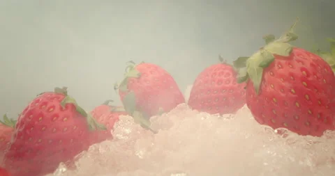 Sweet red berries covered with a white ice liquid. Extreme close-up, macro Stock Footage 239260220