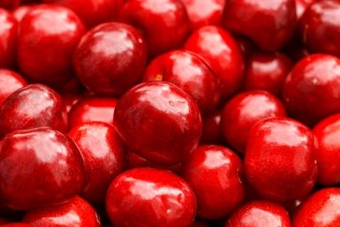 Sweet red cherry background Stock Photos