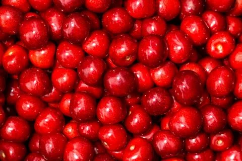 Sweet red cherry background Stock Photos