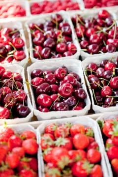 Sweet red cherry closeup macro on market outdoor Stock Photos
