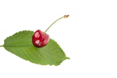 Sweet red cherry on the white background Stock Photos