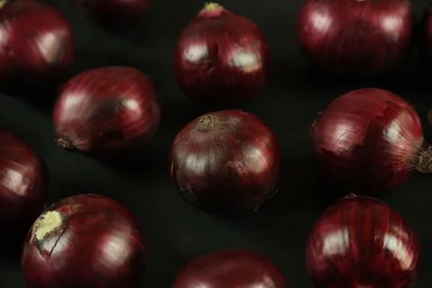 Sweet red onions on background Stock Photos