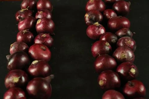 Sweet red onions on background Stock Photos