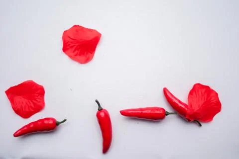Sweet red pepper kapi, three peppers on white wooden table, pepper, chile, ch Stock Photos