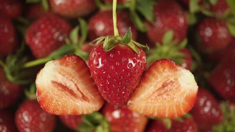 Sweet Red Strawberry On A Background Of Rotating Berry. Stock Footage 196084266