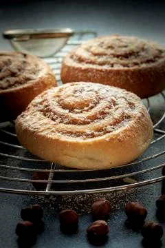 Sweet rolls with cinnamon and cocoa filling Stock Photos