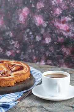 Sweet soft pie served with a cup of coffee Stock Photos